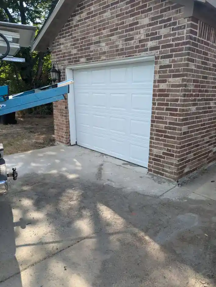 New carriage-style garage door installed in Plano, TX