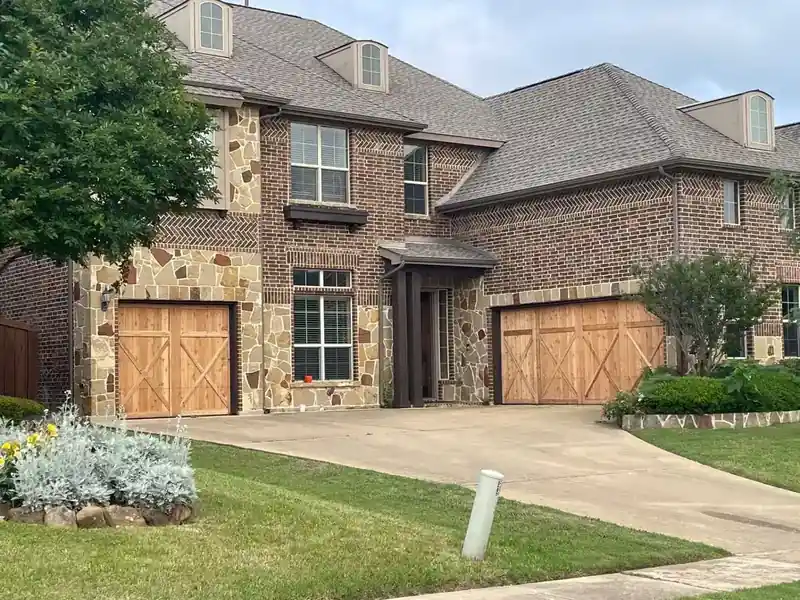 Multi-door custom garage door installation on luxury home in Richardson, TX