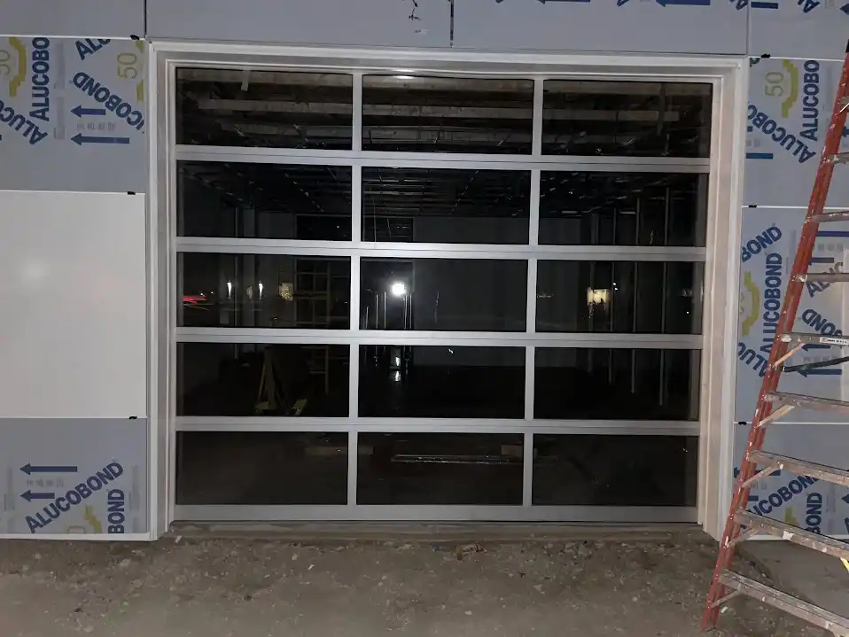 Full view glass garage door installation showcasing quality workmanship in Dallas, TX