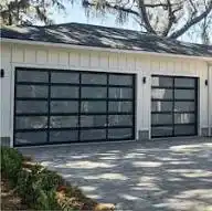 Gray frame full view glass double garage doors