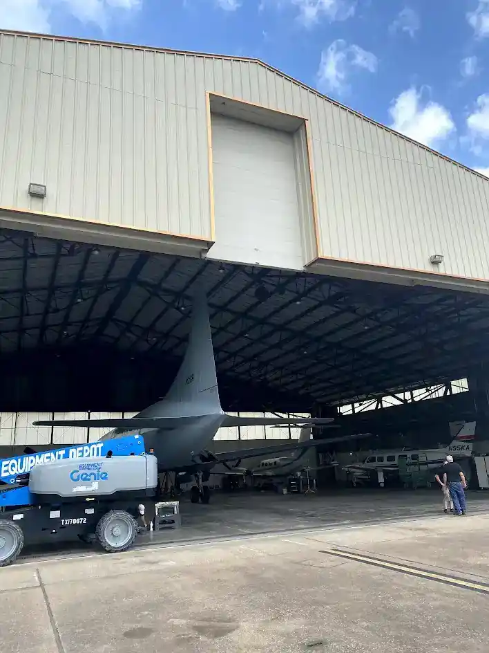 Large hangar-style overhead door installation in North Dallas, TX