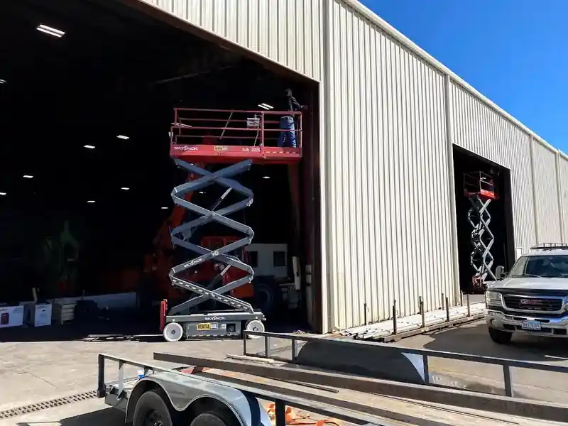 Commercial overhead door installation with dock seal at Dallas warehouse