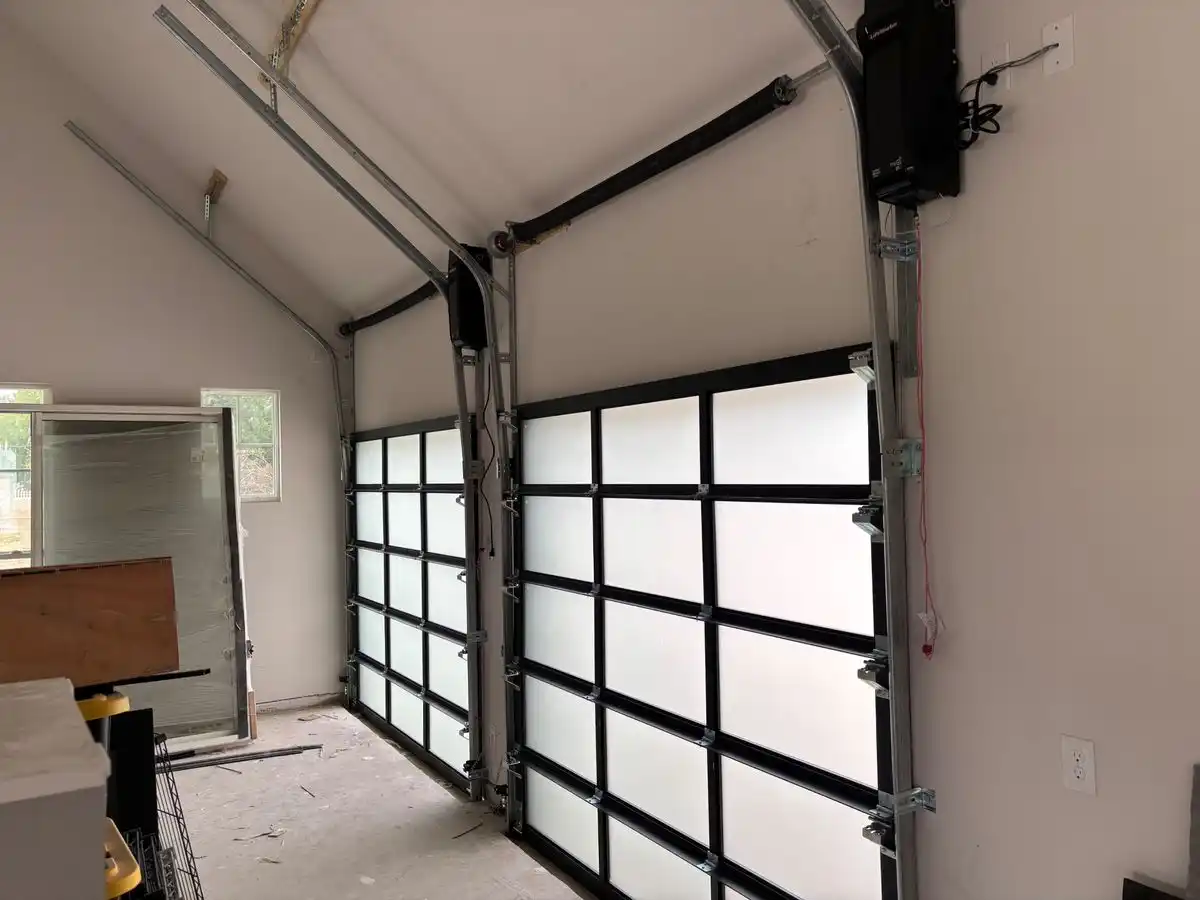 Full view glass garage doors interior view showing natural light in Plano, TX