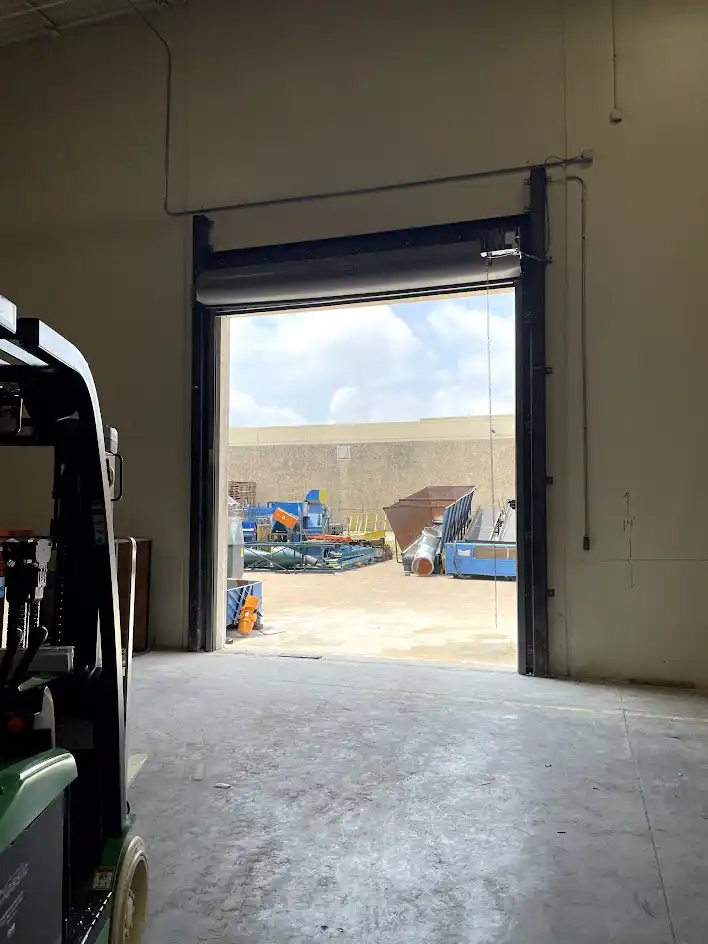 Rolling steel door open position at Dallas warehouse facility